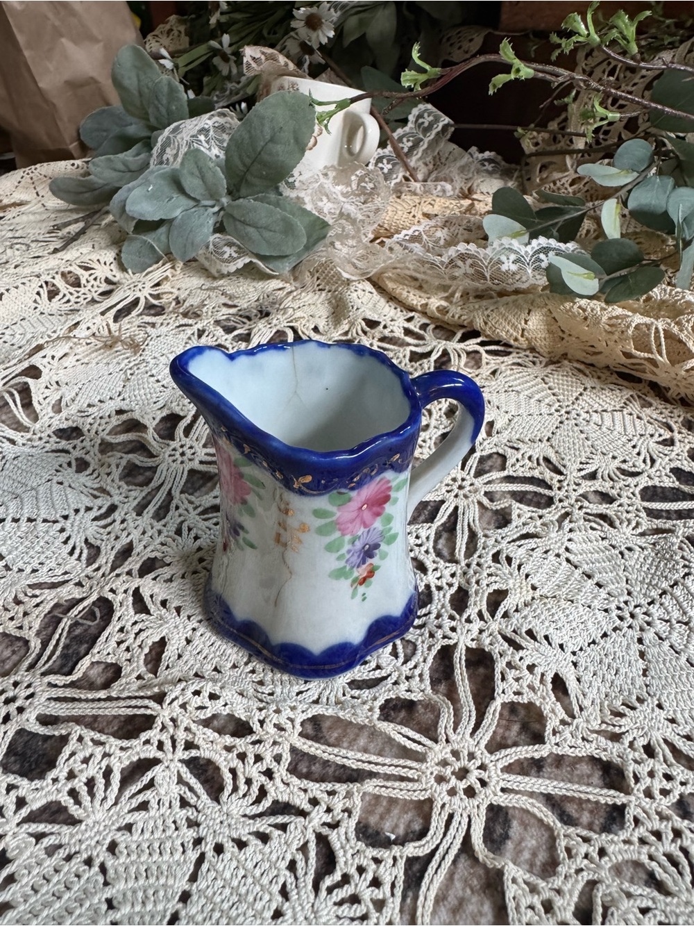 Vintage Blue-Trim Floral Ceramic Pitcher
